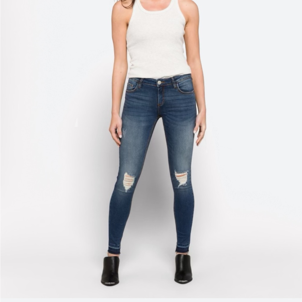 Prosperity super skinny distressed released hem jeans